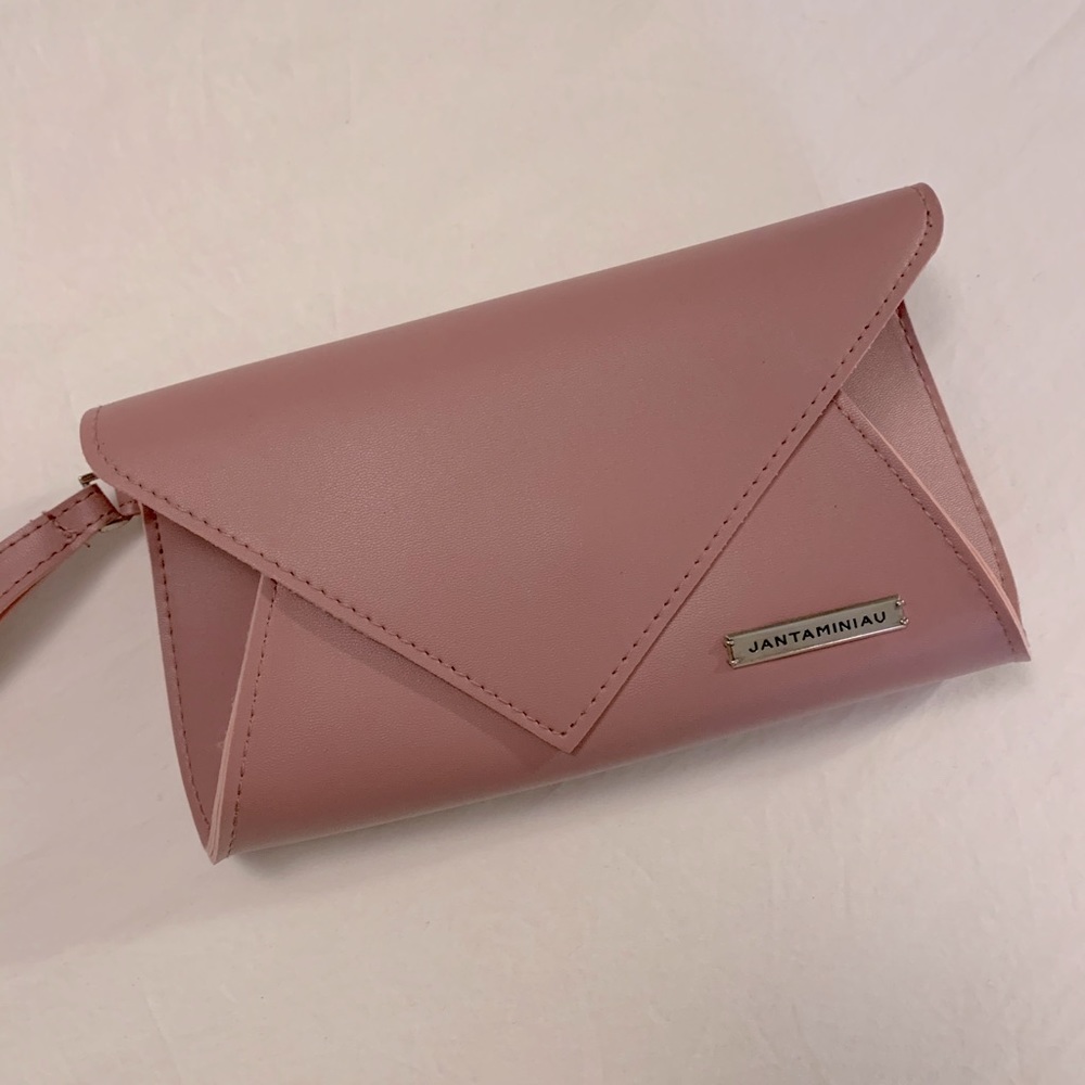 jantaminiau wristlet from Jan Taminiau.